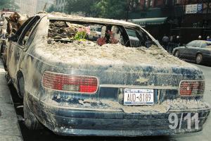 A car that has been covered in mud.